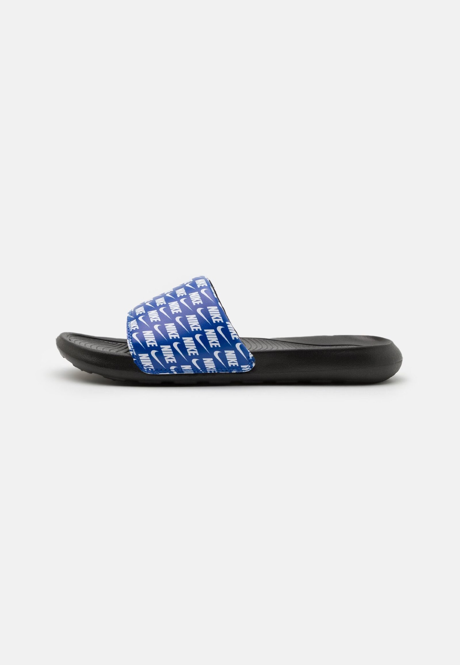The Nike Victori One slide features a printed logo and a slide style